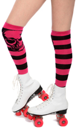 Woman skating with pink socks