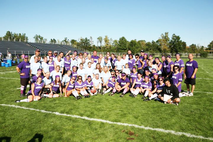 flag football event photo of both competing teams. Blondes vs Brunettes