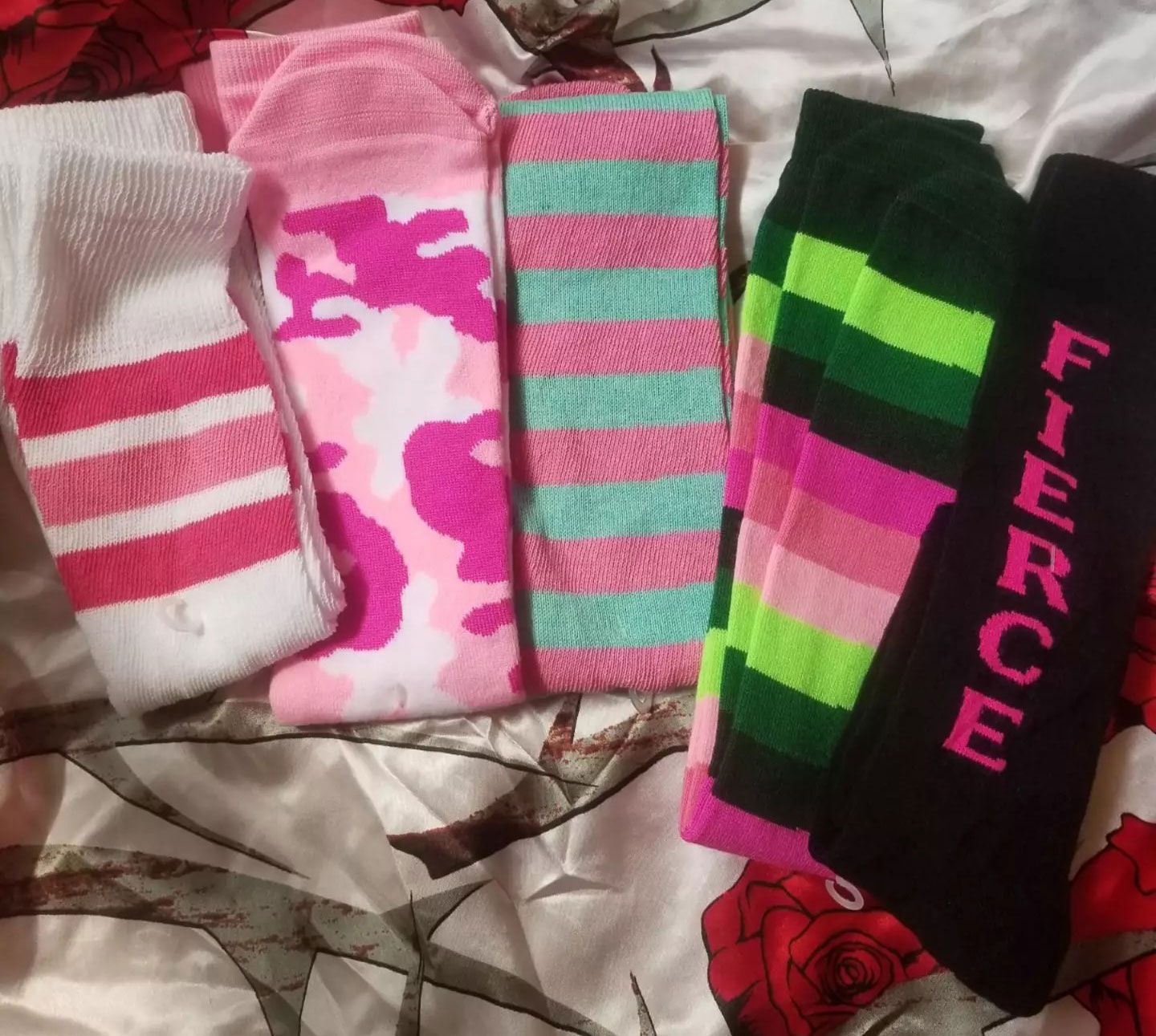 pink thigh highs, army camo, striped socks and wordy